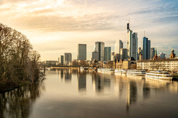 istock frankfurt skyline with reflections in the main river, frankfurt am main, germany 1274018762