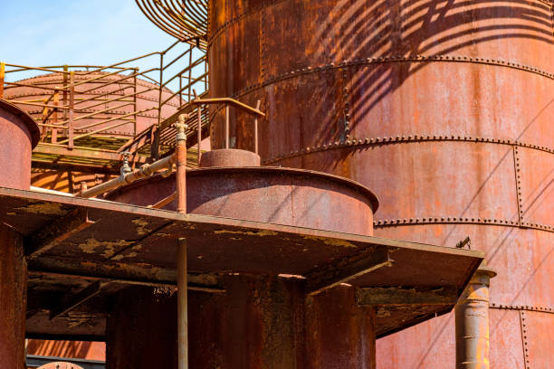 istock Corroded and rusty gears, tanks and pipes 1274026538