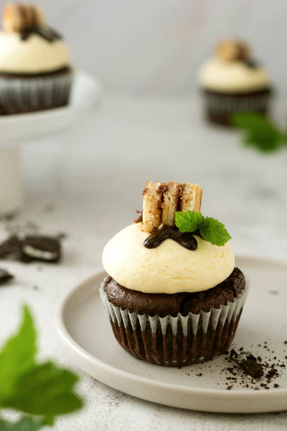 istock Chocolate cupcake with vanilla butter cream. Sweet dessert. 1274066169