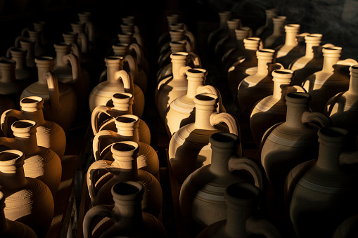 A row of decorative bottles making \