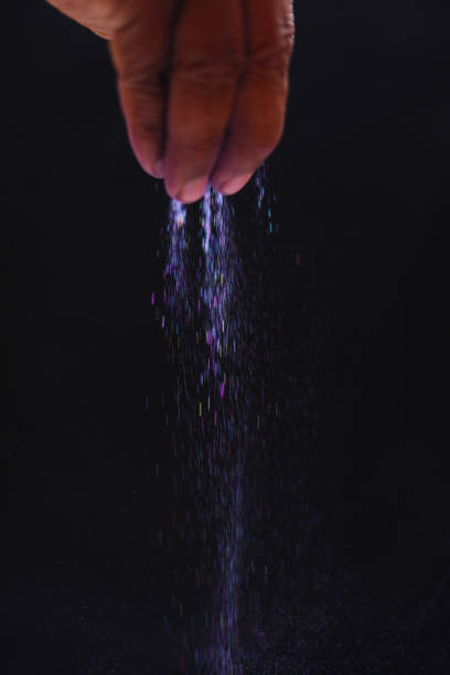istock Colorful Holi powder, which falls on the waterfall effect on a black background 1274084454