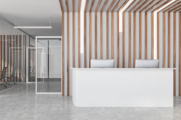 istock White reception desk in wooden office 1274124360