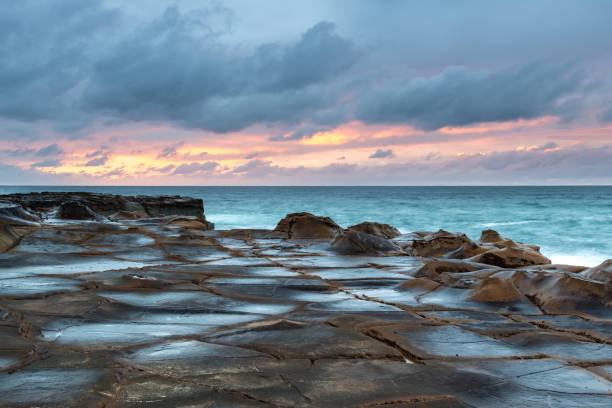 istock Coastal Sunrise Seascape and Tessellated Rock Platform 1274153203