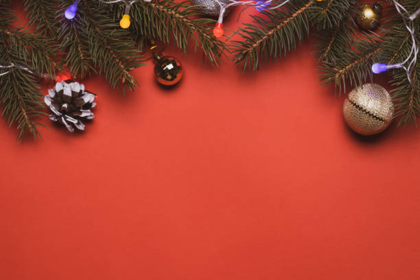 istock christmas decoration backdrop. above view christmas ornament over red moody background. greeting card template 1274163064