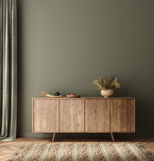 istock Commode with decor in living room interior, dark green wall mock up background 1274163112
