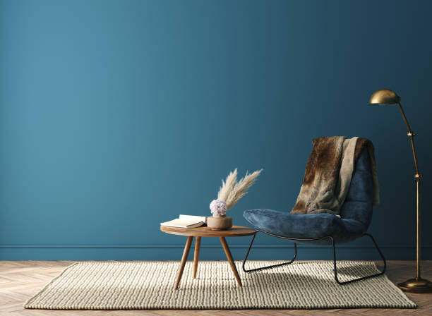 maquette intérieure de maison avec fauteuil vert foncé, table et décor dans le salon - home interior sparse contemporary sofa photos et images de collection