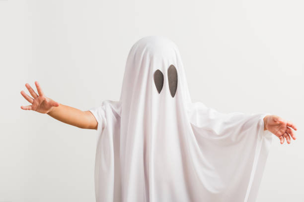 istock little cute child with white dressed costume halloween ghost scary 1274219738