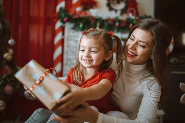 istock Happy Daughter With Christmas Present. 1274272195