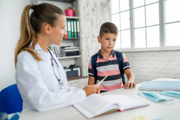 istock Pediatrician checking cute little boy 1274277127