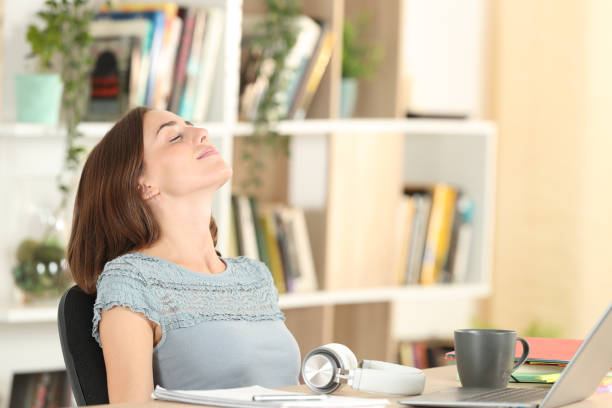 istock Relaxed student breathing fresh air at home 1274288705