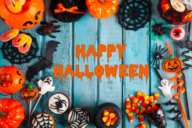 istock Halloween party decorations frame on blue wooden rustic table 1274296504