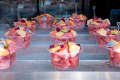Bowls of fruit sold on the food street