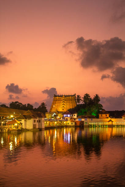 Evening view of padmanabha swamy Temple, Thiruvananthapuram. The temple is built in an intricate fusion of the Chera style and the Dravidian style. The Padmanabhaswamy temple is a Hindu temple located in Thiruvananthapuram, the state capital of Kerala, India. The name of the city of Thiruvananthapuram in Malayalam translates to "The City of Lord Ananta", referring to the deity of the Padmanabhaswamy temple dravidian culture stock pictures, royalty-free photos & images