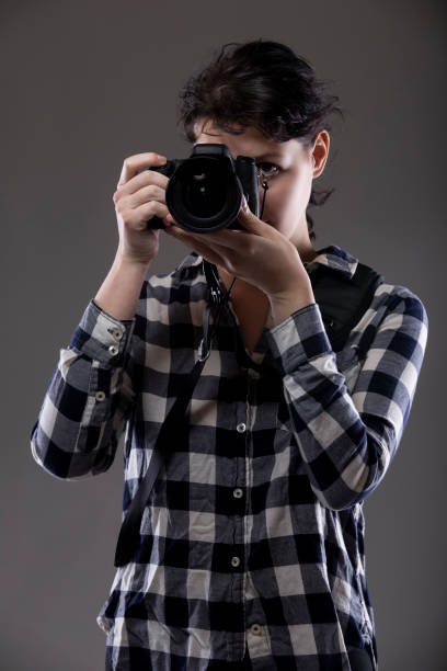 istock Female Photographer Posing for Composites in a Studio 1274364348