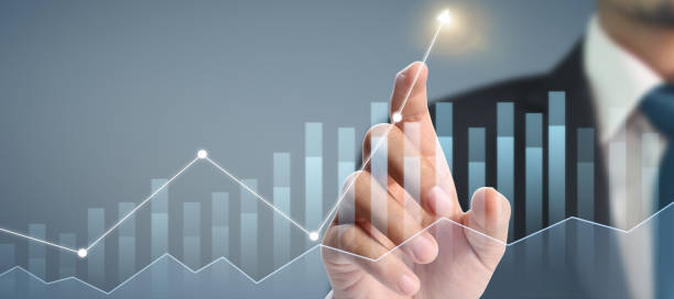 istock Businessman plan graph growth and increase of chart positive indicators in his business 1274376509