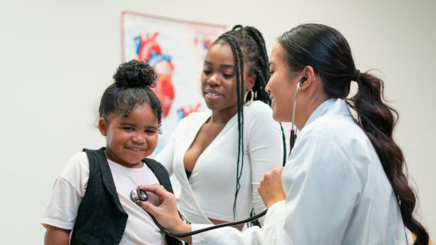 istock Mom and daughter visit the doctor 1274409097