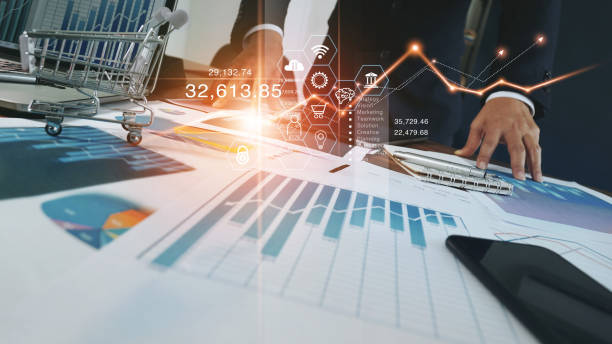 istock Businessman standing in office, analyzing sales data and economic growth graph financial, solution analysis and development contents on table and global network connection interface background. 1274417557