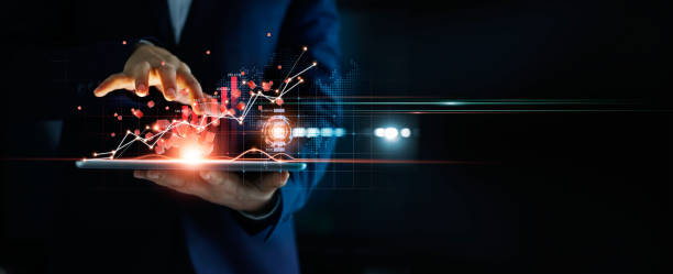 istock Businessman using tablet analyzing sales data and economic growth graph chart and block chain technology on global network on dark background. 1274417638