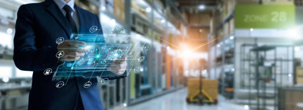 istock Businessman holding virtual interface panel of global logistics network distribution and transportation, Smart logistics, Innovation future of transport on large warehouse center background. 1274428108
