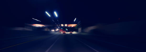 istock Abstract blurry cars highway 1274497562