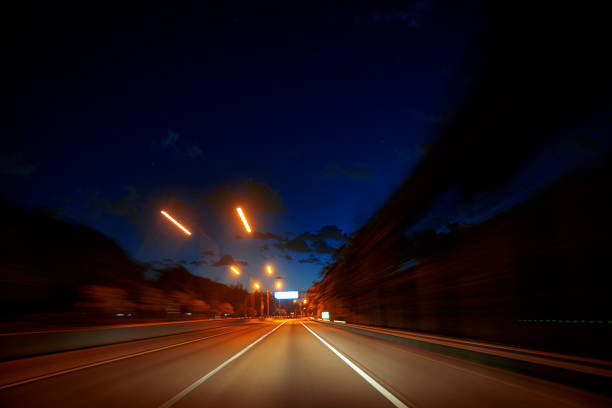istock Driving on an empty turnpike highway Miami 1274497918