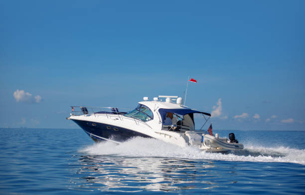 Single motorboat approaching on sea.