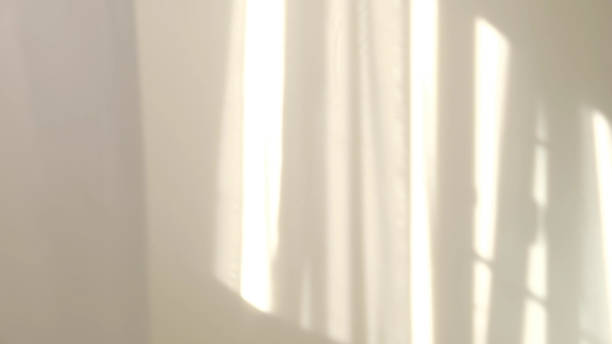 istock Morning sun lighting the room, shadow background overlays 1274504104
