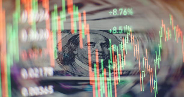 istock Analysis business accounting on info sheets. Businessman hand working on analyzing investment charts for Gold market, Forex market and Trading market. 1274558598