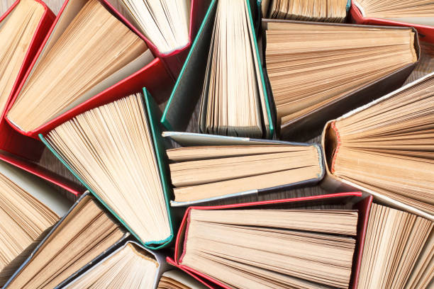 istock Many old books. Used hardback books. View from above 1274564717