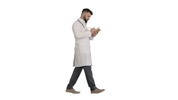 istock Doctor or medic man holding pen and notebook looking for idea wh 1274593549