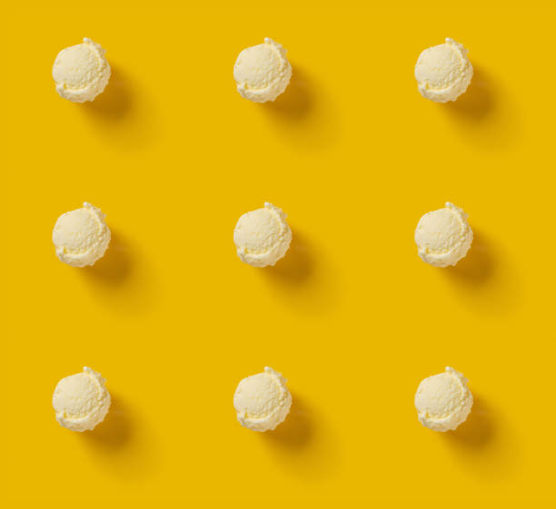istock seamless vanilla flavor ice cream ball on a rose yellow background 1274647334
