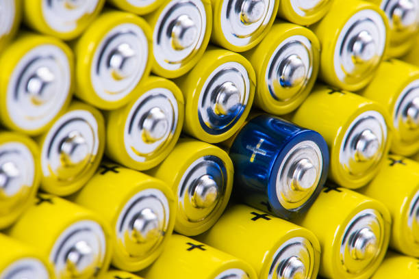 istock Alkaline batteries with selection focus on single one 1274663026