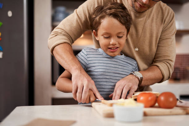 istock Dad is showing me how the best sandwich is made 1274679485