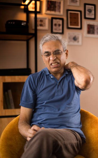 istock Old man suffering with shoulder and back pain 1274686096