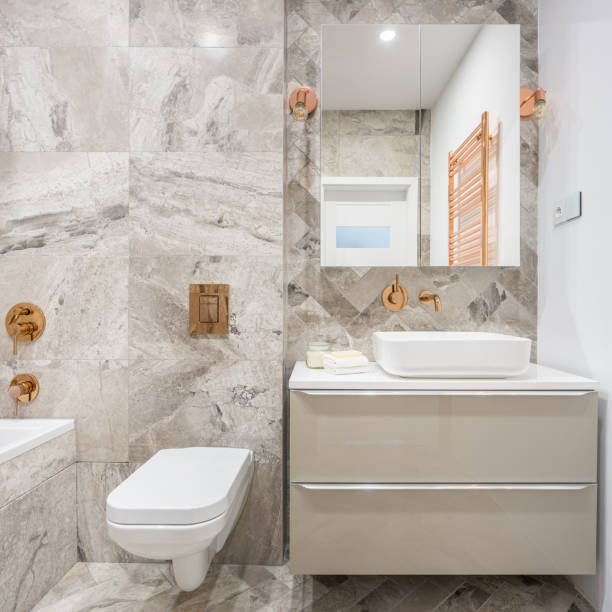 istock Beige bathroom with copper details 1274699696