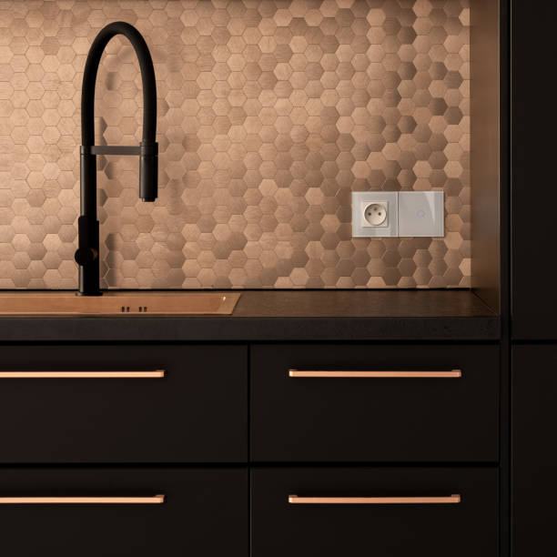 istock Black kitchen with golden details 1274699712