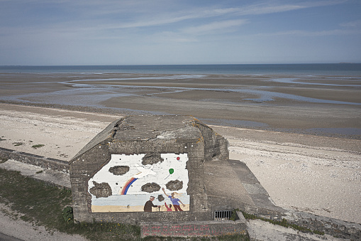 Pouppeville France September 2020 Abandoned german bunkers of II World War painted with a peace message in Utah beach Normandy France.