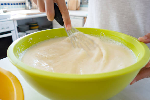 istock Woman preparing pancake batter 1274718471