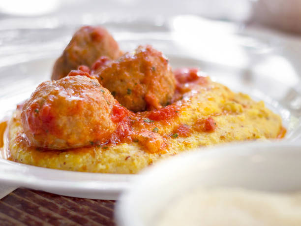 istock Polenta with meatballs in tomato sauce 1274740933