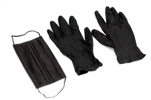 istock Black medical mask and glove 1274757977