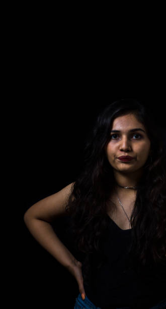 istock Woman in black 1274778012
