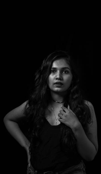 istock Woman in black 1274778040