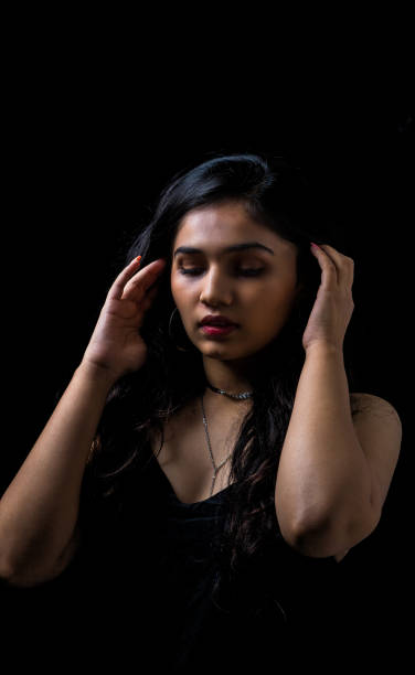 istock Woman in black 1274778096