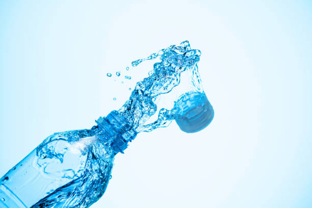 istock Water is poured out of a plastic bottle. 1274787501