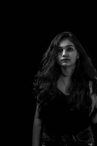 istock Woman in black 1274788306