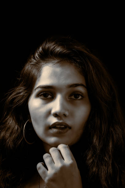 istock Woman in black 1274788432