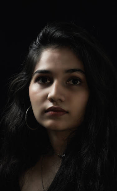 istock Woman in black 1274788573