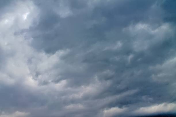 istock Stunning mixed cloud formation panorama in a summer sky 1274789149