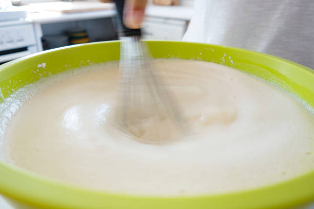 istock Woman preparing pancake batter 1274798716