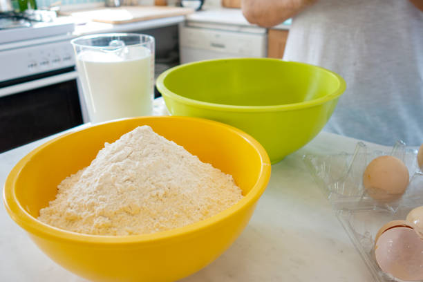 istock Woman preparing pancake batter 1274829047